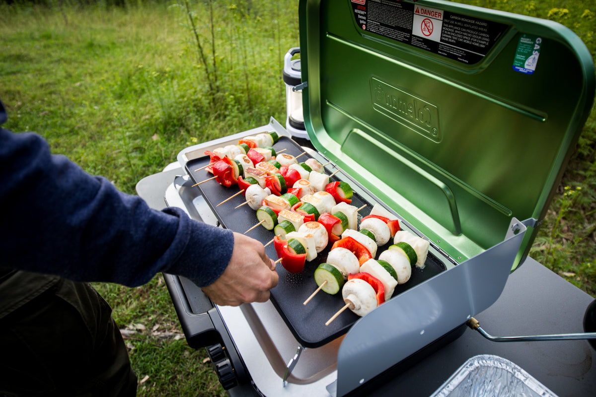 STOVE EVENTEMP WITH GRIDDLE AND GREASE CUP COLEMAN