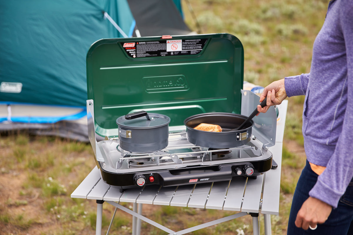 STOVE EVENTEMP WITH GRIDDLE AND GREASE CUP COLEMAN